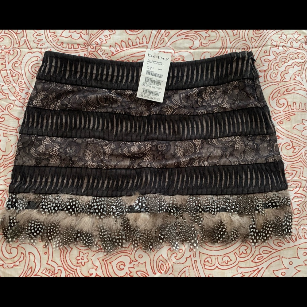 Beautiful Mini skirt, feathers, lace, fun to wear. New.